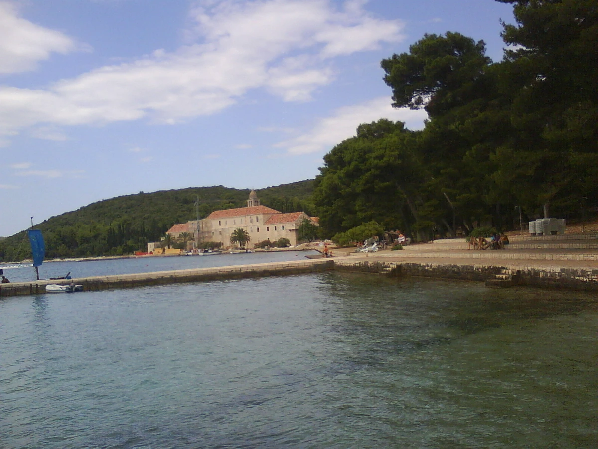 Franciscan monastery above the shore on Badija island near Korcula in Croatia seen from the water